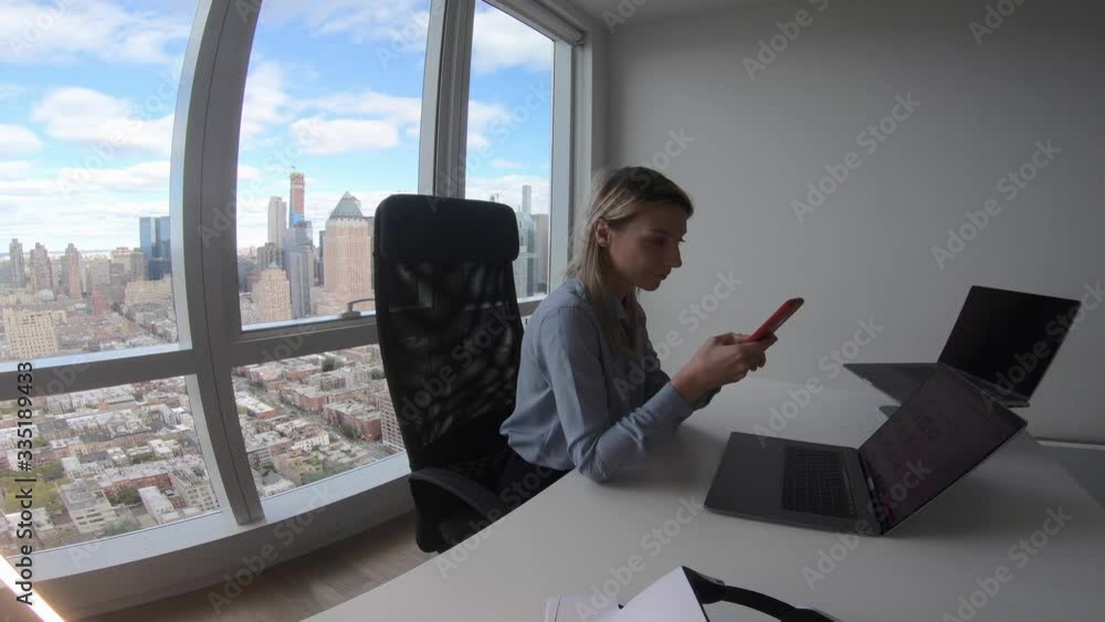 Aufkleber executive manager sharing media files on laptop and mobile gadget using bluetooth connection during 