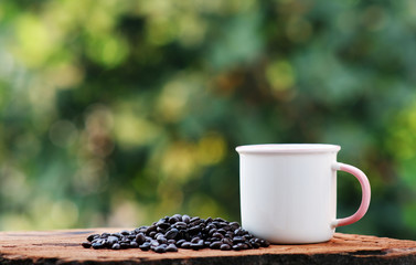 cup of coffee and bread on wood counter background and space for text