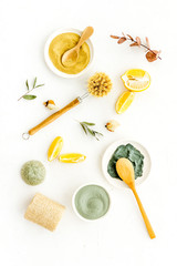 Clay mask in bowl for facial spa on white background top view