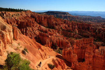 Utah / USA - August 22, 2015: Tourists look Hoodoo landscape and rock formation from a pathway in Bryce Canyon National Park, Utah, USA