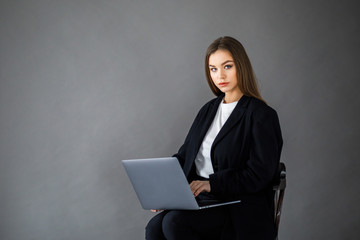 Pretty Girl use Laptop in Studio. Young Business Woman Working Creative Startup modern Office.