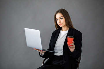 Pretty Girl use Laptop in Studio. Young Business Woman Working Creative Startup modern Office.