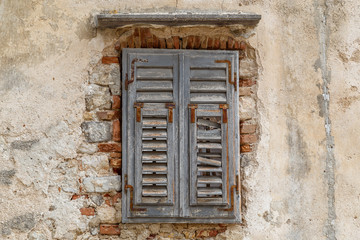 Closed window in Krk town on Krk island, Croatia