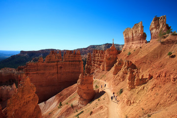 Utah / USA - August 22, 2015: Tourists walking in a pathway near Hoodoo and rock formation in Bryce Canyon National Park, Utah, USA