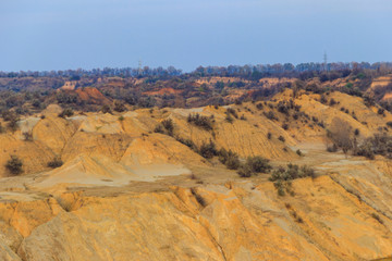 Fototapeta na wymiar View of old sand slag heaps