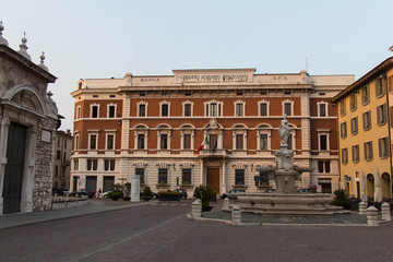 Fototapeta na wymiar Negroboni palace on Piazza Paolo VI, Brescia, Lombardy, Italy.