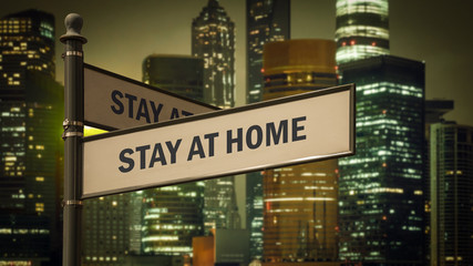 Obraz premium Street Sign STAY AT HOME