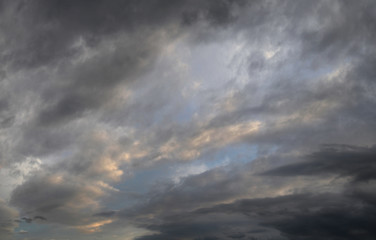 Dramatic sky dackground, stormy clouds in dark sky, meteorology