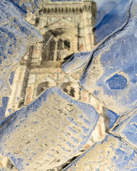 Duomo square, Florence. Giotto's bell tower reflected in a puddle after rain.