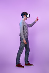 Naklejka premium Man is using virtual reality headset.