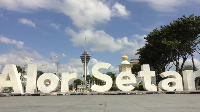 Time lapse: Beautiful sunny and cloudy with Alor Setar Tower landmark at Alor Setar, Kedah, Malaysia. 