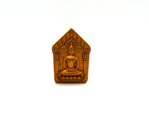 small buddha image used as amulets pendant,thai monk amulet on white image background