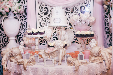 Candy bar with lots of sweets for the baptism party