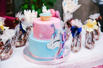 Cake pink and blue on the table