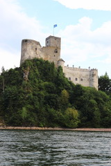 Fototapeta na wymiar Castle on a rock by the lake
