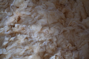 texture and background for work, background, decoration with felt, warming with stone wool under the roof.