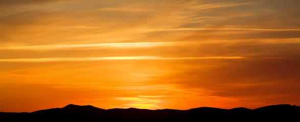 Bright sunset in the mountains, natural backgrounds