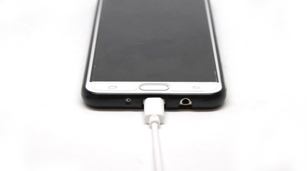 Charge line with a smartphone isolated on white background.