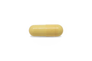 Yellow Capsule Pill on isolated white background with clipping path.