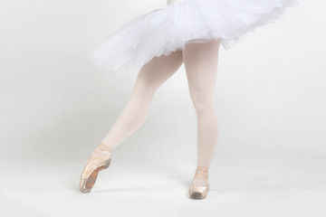 Young ballerina practising ballet moves