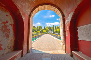 Peschiera del Garda colorful Italian town bridge and city walls entrance view