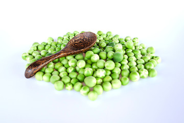 Top view turkey berry or Pea eggplant and wooden spoon isolated on white background.