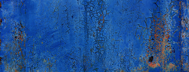 blue coroded metal sheet background with peeling paint flakes