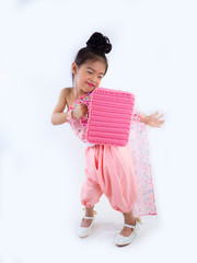 children girl in pink traditional Thai dress with bag for Welcome Songkran Festival on white background