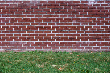 Weathered stained old brick wall background, pattern texture