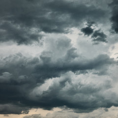 Fototapeta na wymiar Dark sky with heavy stormy clouds