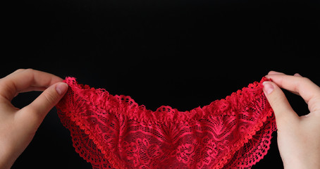 set of women's lace panties on a white background. Women's underwear on the table