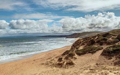 Cloudscape and beach scene with dunes at Point Addis, Surf Coast