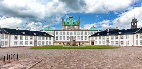 Fredensborg Palace in Denmark – royal residence with baroque architecture and courtyard under...