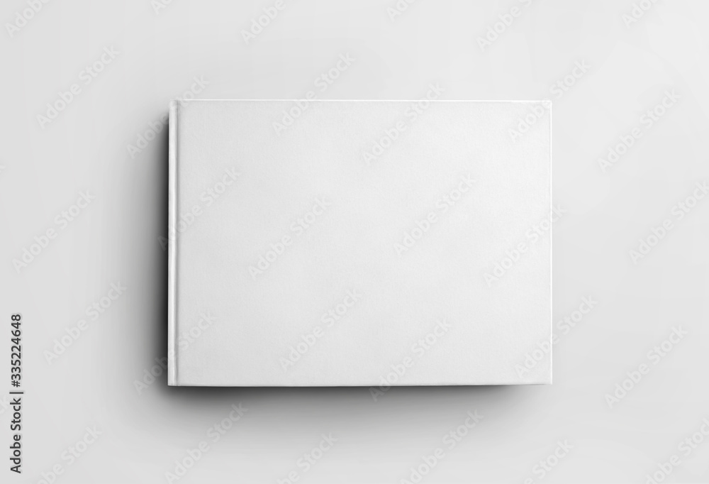 Poster mockup blank white closed book isolated on background, front view. hardcover landscape orientation o