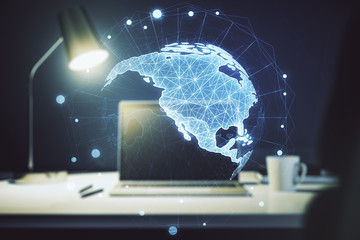 Double exposure of digital America map on laptop background, research and strategy concept