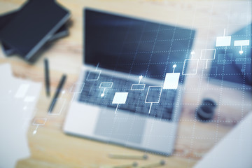 Multi exposure of abstract creative financial graph on modern computer background, forex and investment concept