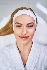 Happy young woman after beauty care stock photo