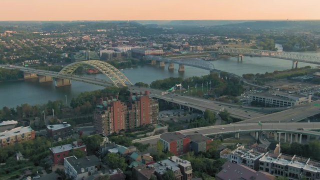 Aerial: Freeway traffic on Daniel Carter Beard Bridge over the Ohio River. Cincinnati, Ohio, USA. 