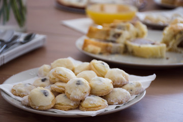 bride cookies on the table, traditional czech wedding cakes, small pastry on wedding table