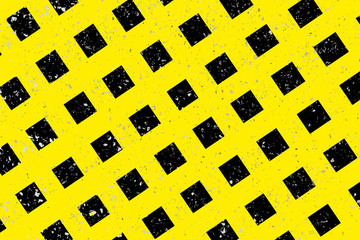 Quadrillage jaune peint sur asphalte 
