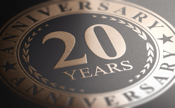 20th anniversary, golden stamp over black background. Twenty years celebration card