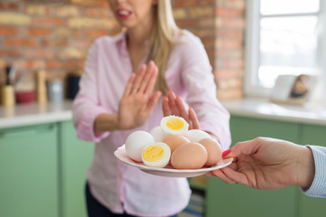 Woman refusing to eat eggs because of her allergy