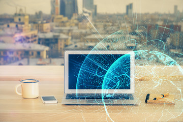 Computer on desktop with social network theme icon. Multi exposure. Concept of international...
