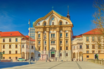 Fototapeta na wymiar Ursuline Church of the Holy Trinity on Congress Square in the central part of Ljubljana, Slovenia
