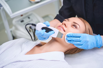 Woman during facial in salon stock photo