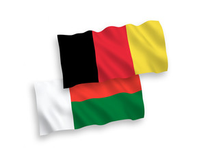 Flags of Belgium and Madagascar on a white background