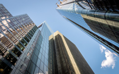 City of London skyscrapers. A low, wide angle view of anonymous modern architecture within the financial heart of the City of London.