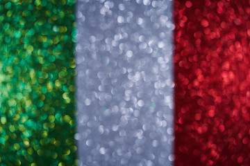 Background image of the flag of Italy. New Year decoration. Beautiful background from spangles, glitter. Small and large circles