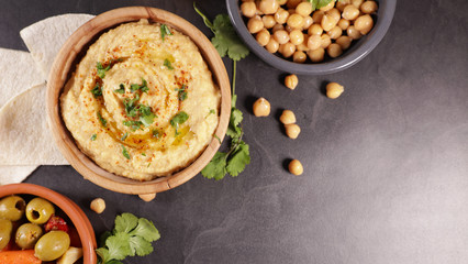 hummus with olives and pita bread