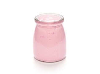 natural homemade strawberry yogurt in a glass jar isolated